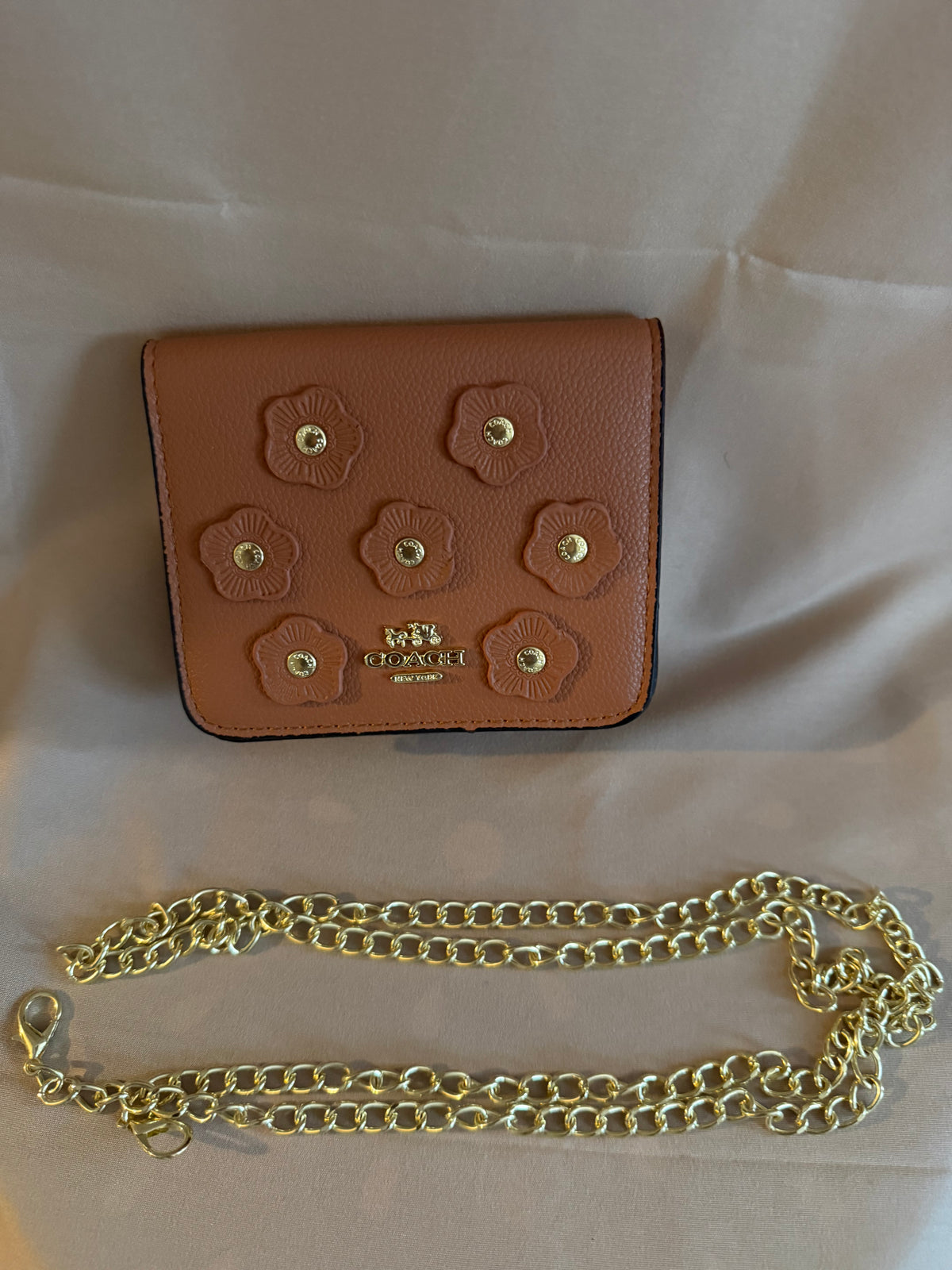 Coach floral studded wallet closed with gold chain strap